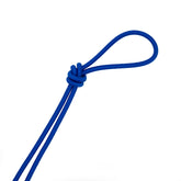 A close-up of a royal blue elastic cord, 3mm thick, tied in a knot with a loop. EK-3MM-ROYAL-BLUE-PM