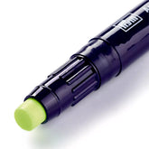 Close-up of a dark purple Prym fabric glue marker with a light green tip, showing ribbed detail. PRYM-987185