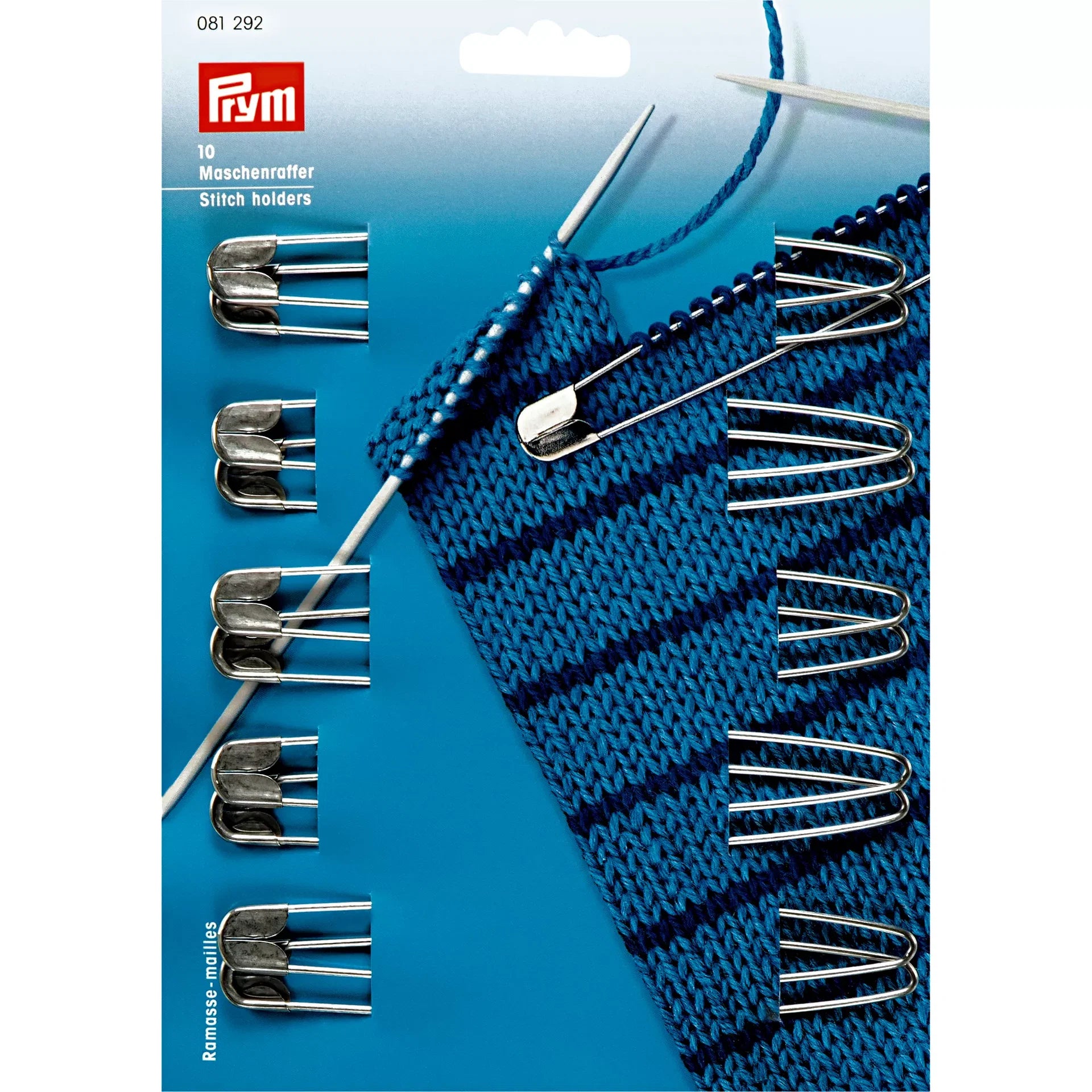 Verpakking met 10 zilverkleurige Prym steekhouders van 135mm, met een voorbeeld van gebruik op gebreid blauw textiel. EAN 4002270812921. | PRYM-081292 | 4002270812921