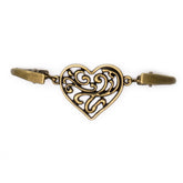 Ornate bronze heart-shaped vest clasp with clips, intricate filigree design, antique finish. VESTSLUITING-HART-BRONS