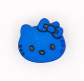 A bright blue Hello Kitty head charm with a black bow and facial features, isolated on a white background. KNP00024