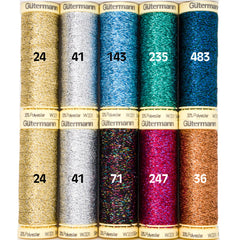 Gütermann metallic naaigaren spoelen in goud, zilver, blauw, groen, teal, zwart, roze en koper. Tien spoelen getoond. 4005510488117