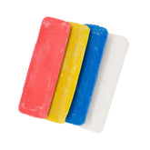 Four rectangular tailor's chalk sticks in red, yellow, blue, and white, presented loose on a white background. KRT00001