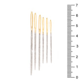 Six Cose hand needles with gold eyes and silver shafts, shown with a ruler. COSE-102125.142 1021251420000