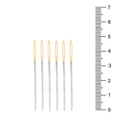 Five silver hand needles with gold eyes are shown next to a ruler. COSE-102125.018 1021250180000